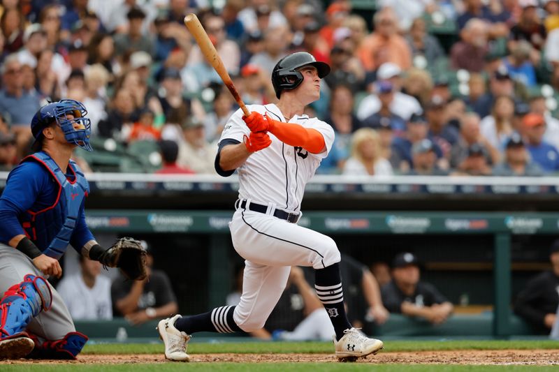 Aug 23, 2023; Detroit, Michigan, USA;  Detroit Tigers right fielder Kerry Carpenter (30) hits a grand slam in the sixth inning against the Chicago Cubs at Comerica Park. Mandatory Credit: Rick Osentoski-USA TODAY Sports