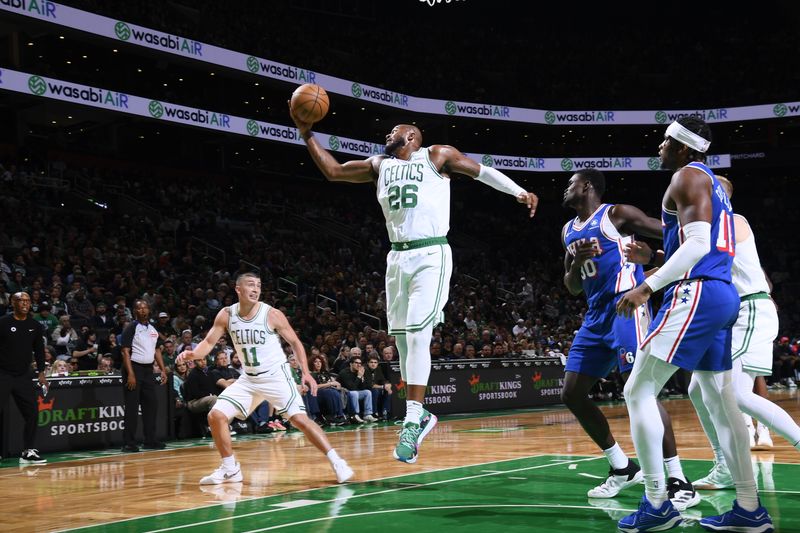 BOSTON, MA - OCTOBER 12: Xavier Tillman #26 of the Boston Celtics goes up for the rebound during the game against the Philadelphia 76ers during a NBA Preseason game on October 12, 2024 at TD Garden in Boston, Massachusetts. NOTE TO USER: User expressly acknowledges and agrees that, by downloading and/or using this Photograph, user is consenting to the terms and conditions of the Getty Images License Agreement. Mandatory Copyright Notice: Copyright 2024 NBAE (Photo by Brian Babineau/NBAE via Getty Images)