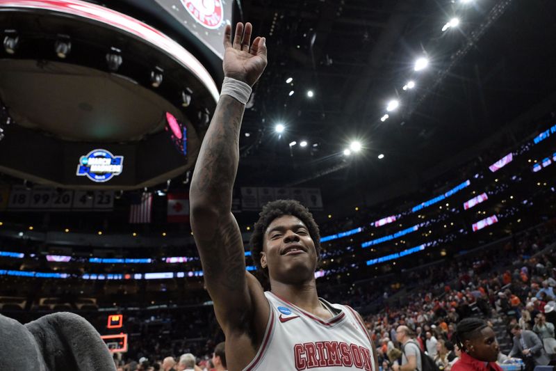 Mar 30, 2024; Los Angeles, CA, USA; Alabama Crimson Tide forward Nick Pringle (23) celebrates after defeating the Clemson Tigers in the finals of the West Regional of the 2024 NCAA Tournament at Crypto.com Arena. Mandatory Credit: Jayne Kamin-Oncea-USA TODAY Sports