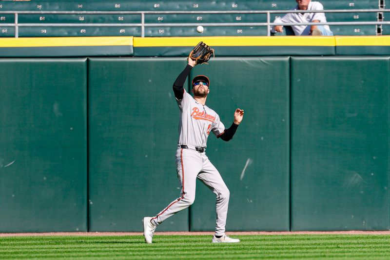 Sep 17, 2025; Chicago, Illinois, USA; Baltimore Orioles outfielder Dylan Carlson (15) catches a final out hit by Chicago White Sox shortstop Colson Montgomery during the ninth inning at Rate Field. Mandatory Credit: Kamil Krzaczynski-Imagn Images