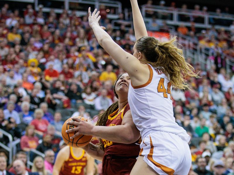 Mar 12, 2024; Kansas City, MO, USA; Texas Longhorns forward Taylor Jones (44) blocks Iowa State Cyclones center Audi Crooks (55) during the second half at T-Mobile Center. Mandatory Credit: William Purnell-USA TODAY Sports