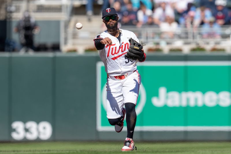 Apr 6, 2024; Minneapolis, Minnesota, USA; Minnesota Twins third base Willi Castro (50) throws out Cleveland Guardians center fielder Tyler Freeman (2) in the seventh inning at Target Field. Mandatory Credit: Matt Blewett-USA TODAY Sports