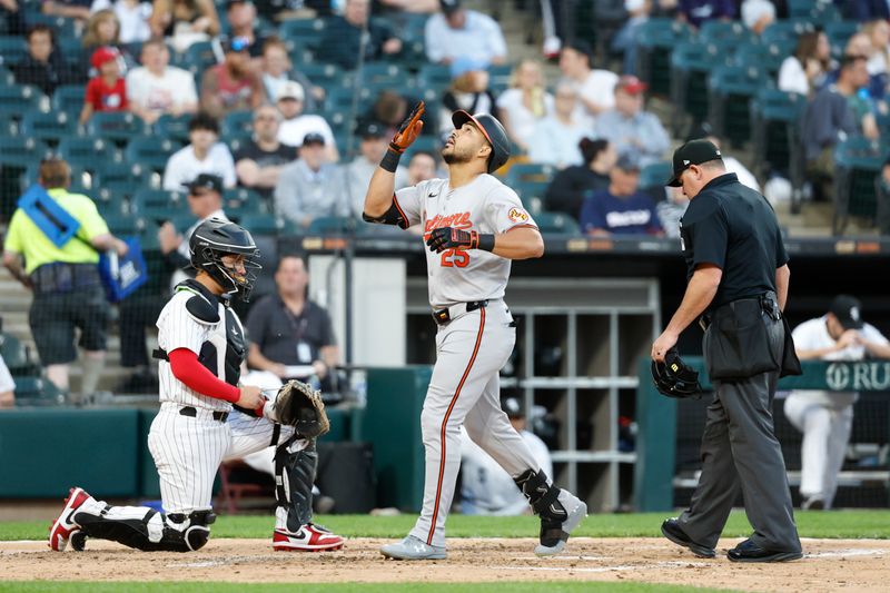 May 23, 2024; Chicago, Illinois, USA; Baltimore Orioles outfielder Anthony Santander (25) crosses home plate after hitting a solo home run against the Chicago White Sox during the fourth inning at Guaranteed Rate Field. Mandatory Credit: Kamil Krzaczynski-USA TODAY Sports