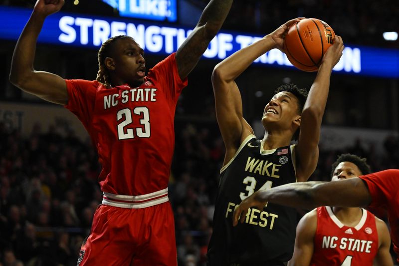 Jan 28, 2023; Winston-Salem, North Carolina, USA;   Wake Forest Demon Deacons forward Bobi Klintman (34) goes up for a shot against North Carolina State Wolfpack forward Greg Gantt (23) during the first half at Lawrence Joel Veterans Memorial Coliseum. Mandatory Credit: William Howard-USA TODAY Sports