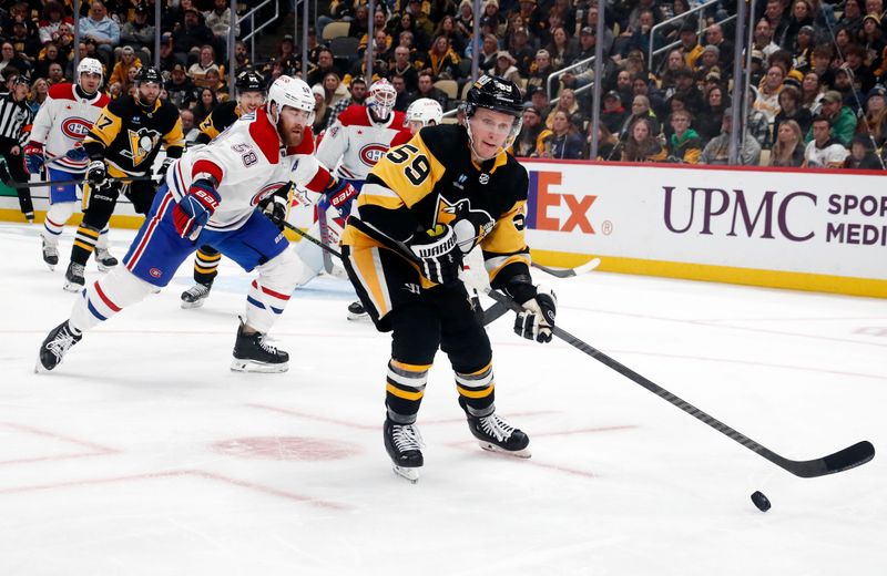 Jan 27, 2024; Pittsburgh, Pennsylvania, USA;  Pittsburgh Penguins left wing Jake Guentzel (59) handles the puck against the Montreal Canadiens during the third period at PPG Paints Arena. The Penguins won 3-2 in overtime. Mandatory Credit: Charles LeClaire-USA TODAY Sports