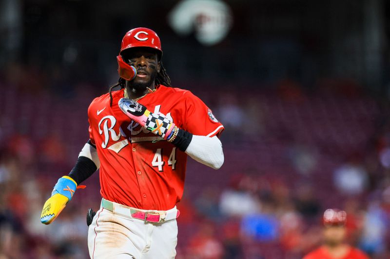 Apr 30, 2025; Cincinnati, Ohio, USA; Cincinnati Reds shortstop Elly De La Cruz (44) scores on a RBI single hit by second baseman Santiago Espinal (not pictured) in the sixth inning against the St. Louis Cardinals at Great American Ball Park. Mandatory Credit: Katie Stratman-Imagn Images