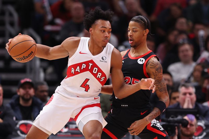 CHICAGO, ILLINOIS - JANUARY 30: Scottie Barnes #4 of the Toronto Raptors drives to the basket against Dalen Terry #25 of the Chicago Bulls during the first half at the United Center on January 30, 2024 in Chicago, Illinois. NOTE TO USER: User expressly acknowledges and agrees that, by downloading and or using this photograph, User is consenting to the terms and conditions of the Getty Images License Agreement.  (Photo by Michael Reaves/Getty Images)