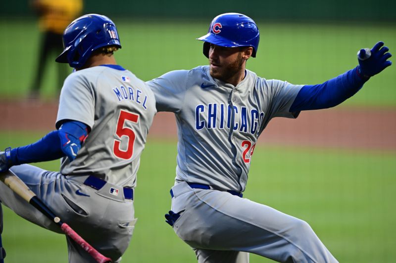 May 10, 2024; Pittsburgh, Pennsylvania, USA; Chicago Cubs designated hitter Cody Ballinger (24) is congratulated by third baseman Christopher Morel (5) after hitting a solo home run in the first inning against the Pittsburgh Pirates at PNC Park. Mandatory Credit: David Dermer-USA TODAY Sports