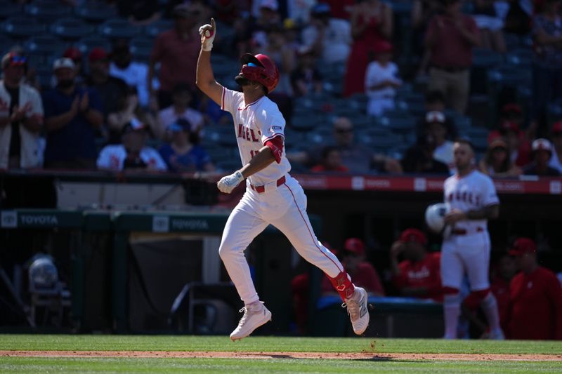 May 11, 2025; Anaheim, California, USA; Los Angeles Angels left fielder Matthew Lugo (15) celebrates after hitting a home run in the ninth inning against the Baltimore Orioles at Angel Stadium. Mandatory Credit: Kirby Lee-Imagn Images