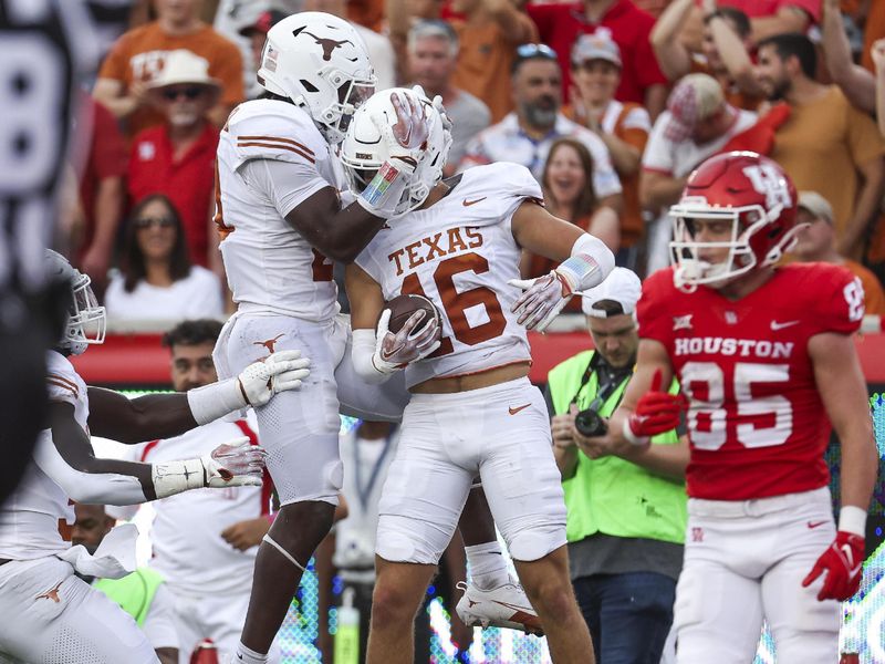 Oct 21, 2023; Houston, Texas, USA;  Texas Longhorns defensive back Michael Taaffe (16) celebrates after an interception during the fourth quarter against the Houston Cougars at TDECU Stadium. Mandatory Credit: Troy Taormina-USA TODAY Sports