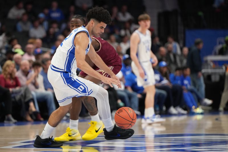 Mar 12, 2026; Charlotte, NC, USA; Duke Blue Devils guard Cayden Boozer (2) with the ball in the first half at Spectrum Center. Mandatory Credit: Bob Donnan-Imagn Images
