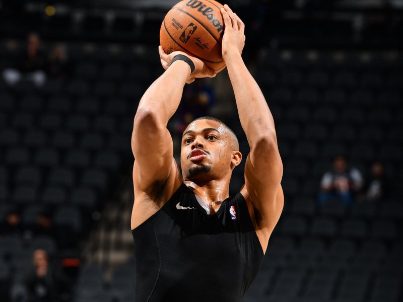 SAN ANTONIO, TX - JANUARY 15: Keldon Johnson #0 of the San Antonio Spurs warms up before the game against the Memphis Grizzlies on January 15, 2025 at the Frost Bank Center in San Antonio, Texas. NOTE TO USER: User expressly acknowledges and agrees that, by downloading and or using this photograph, user is consenting to the terms and conditions of the Getty Images License Agreement. Mandatory Copyright Notice: Copyright 2025 NBAE (Photos by Barry Gossage/NBAE via Getty Images)