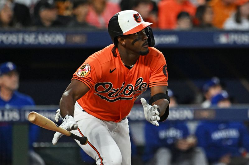 Oct 8, 2023; Baltimore, Maryland, USA; Baltimore Orioles shortstop Jorge Mateo (3) hits a double during the sixth inning against the Texas Rangers during game two of the ALDS for the 2023 MLB playoffs at Oriole Park at Camden Yards. Mandatory Credit: Tommy Gilligan-USA TODAY Sports