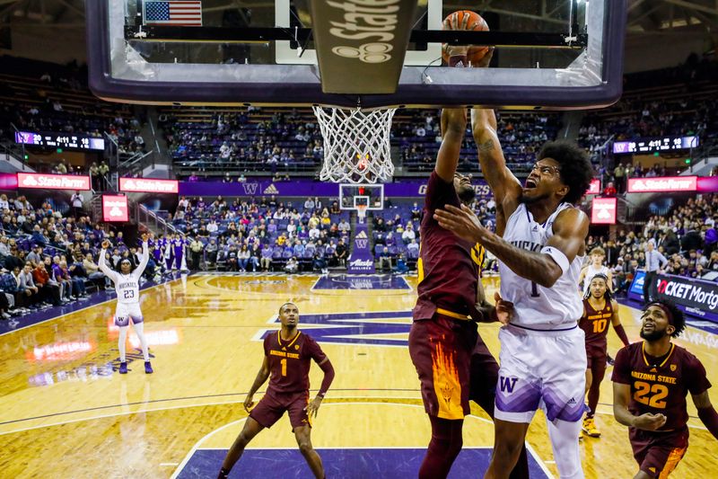 Jan 26, 2023; Seattle, Washington, USA; Arizona State Sun Devils guard Devan Cambridge (35) blocks a dunk attempt by Washington Huskies forward Keion Brooks (1) during the first half at Alaska Airlines Arena at Hec Edmundson Pavilion. Mandatory Credit: Joe Nicholson-USA TODAY Sports