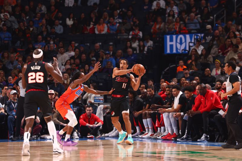 OKLAHOMA CITY, OK - JANUARY 23: Malcolm Brogdon #11 of the Portland Trail Blazers looks to pass the ball during the game against the Oklahoma City Thunder on January 23, 2024 at Paycom Arena in Oklahoma City, Oklahoma. NOTE TO USER: User expressly acknowledges and agrees that, by downloading and or using this photograph, User is consenting to the terms and conditions of the Getty Images License Agreement. Mandatory Copyright Notice: Copyright 2024 NBAE (Photo by Zach Beeker/NBAE via Getty Images)