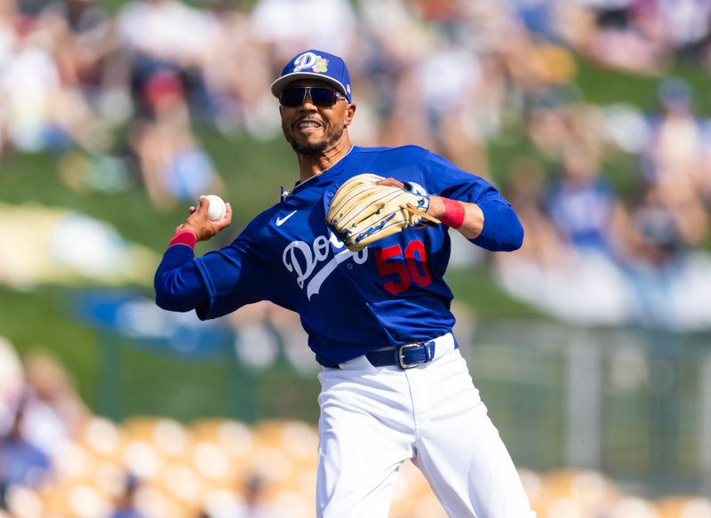 Mar 1, 2026; Phoenix, Arizona, USA; Los Angeles Dodgers shortstop Mookie Betts against the Los Angeles Angels during a spring training game at Camelback Ranch-Glendale. Mandatory Credit: Mark J. Rebilas-Imagn Images