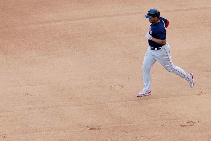 Aug 17, 2023; Washington, District of Columbia, USA; Boston Red Sox third baseman Rafael Devers (11) rounds the bases after hitting a two run home run against the Washington Nationals during the seventh inning at Nationals Park. Mandatory Credit: Geoff Burke-USA TODAY Sports