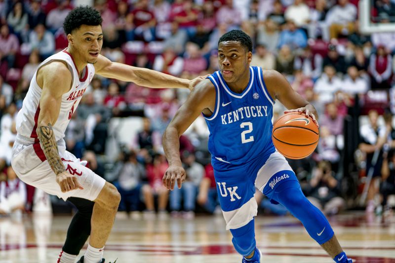 Jan 7, 2023; Tuscaloosa, Alabama, USA; Kentucky Wildcats guard Sahvir Wheeler (2) controls the ball against Alabama Crimson Tide guard Jahvon Quinerly (5) during first half at Coleman Coliseum. Mandatory Credit: Marvin Gentry-USA TODAY Sports