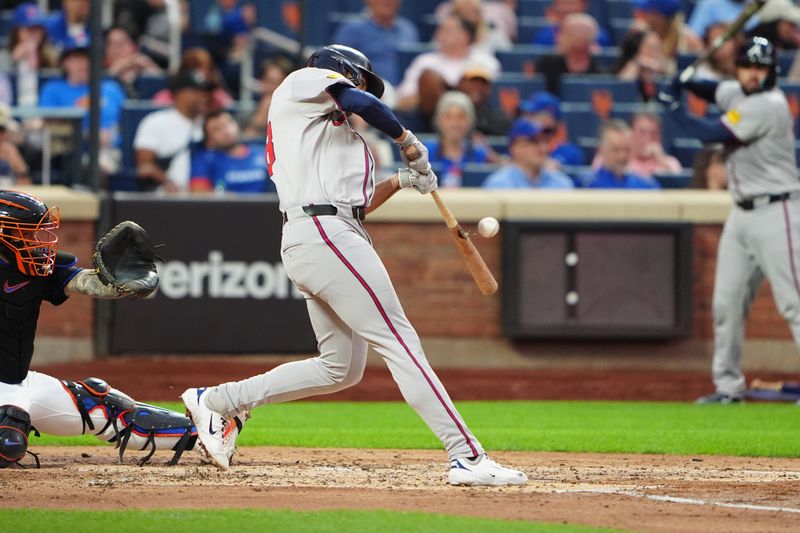 Jul 25, 2024; New York City, New York, USA; Atlanta Braves first baseman Matt Olson (28) hits a single against the New York Mets during the third inning at Citi Field. Mandatory Credit: Gregory Fisher-USA TODAY Sports