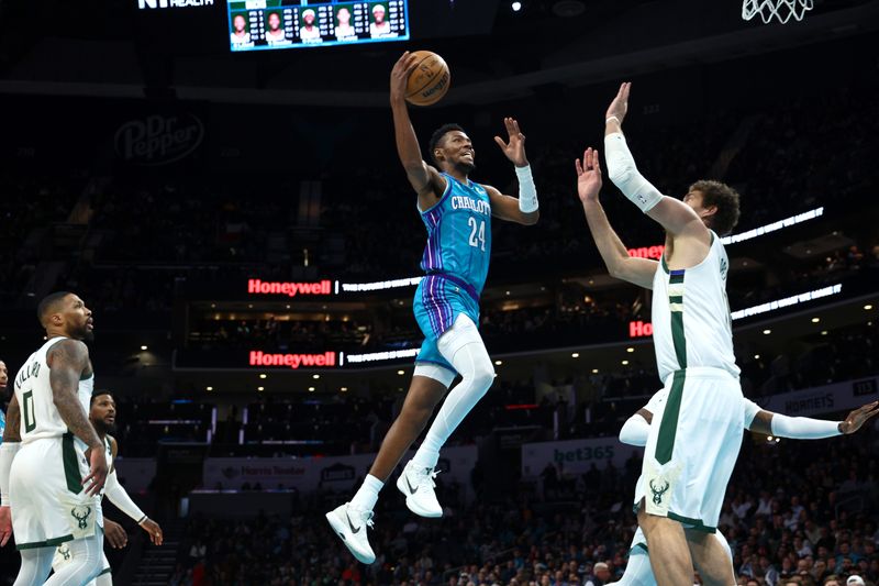 CHARLOTTE, NORTH CAROLINA - FEBRUARY 29: Brandon Miller #24 of the Charlotte Hornets drives to the basket during the first half of the game against the Milwaukee Bucks at Spectrum Center on February 29, 2024 in Charlotte, North Carolina. NOTE TO USER: User expressly acknowledges and agrees that, by downloading and or using this photograph, User is consenting to the terms and conditions of the Getty Images License Agreement. (Photo by Jared C. Tilton/Getty Images)