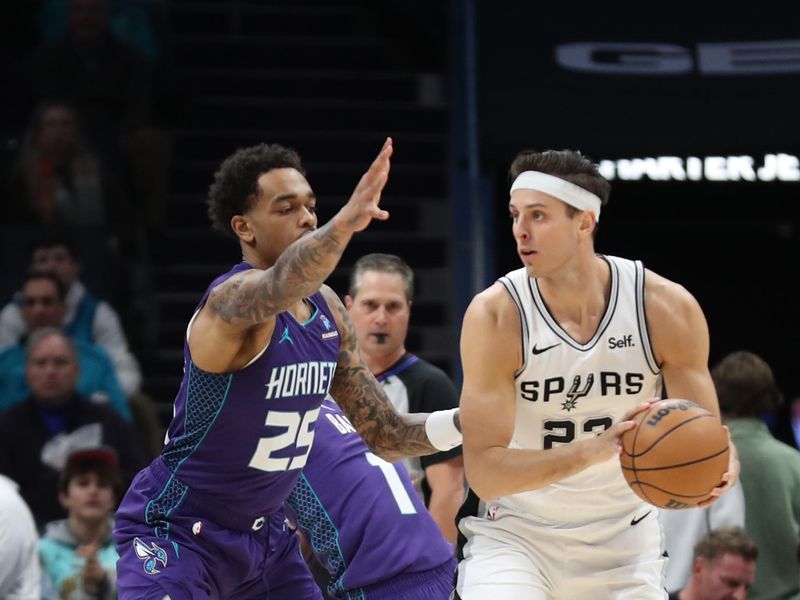 CHARLOTTE, NC - JANUARY 19: Zach Collins #23 of the San Antonio Spurs handles the ball during the game against the Charlotte Hornets on January 19, 2024 at Spectrum Center in Charlotte, North Carolina. NOTE TO USER: User expressly acknowledges and agrees that, by downloading and or using this photograph, User is consenting to the terms and conditions of the Getty Images License Agreement.  Mandatory Copyright Notice:  Copyright 2024 NBAE (Photo by Brock Williams-Smith/NBAE via Getty Images)