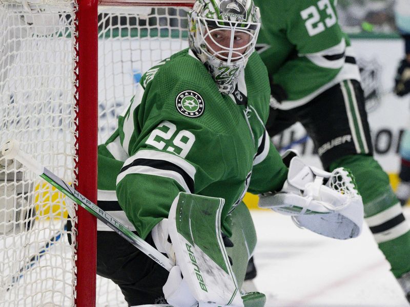 May 15, 2023; Dallas, Texas, USA; Dallas Stars goaltender Jake Oettinger (29) faces the Seattle Kraken attack in the Stars zone during the first period in game seven of the second round of the 2023 Stanley Cup Playoffs at the American Airlines Center. Mandatory Credit: Jerome Miron-USA TODAY Sports