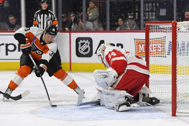 Jan 21, 2025; Philadelphia, Pennsylvania, USA; Philadelphia Flyers right wing Matvei Michkov (39) takes a shot on goal against Detroit Red Wings goaltender Alex Lyon (34) during the first period at Wells Fargo Center. Mandatory Credit: Eric Hartline-Imagn Images Jan 21, 2025; Philadelphia, Pennsylvania, USA; Philadelphia Flyers right wing Matvei Michkov (39) takes a shot on goal against Detroit Red Wings goaltender Alex Lyon (34) during the first period at Wells Fargo Center. Mandatory Credit: Eric Hartline-Imagn Images