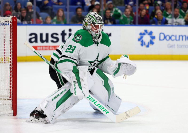 Feb 6, 2024; Buffalo, New York, USA;  Dallas Stars goaltender Jake Oettinger (29) looks for the puck during the second period against the Buffalo Sabres at KeyBank Center. Mandatory Credit: Timothy T. Ludwig-USA TODAY Sports