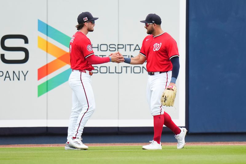 Mar 4, 2025; West Palm Beach, Florida, USA; Washington Nationals outfielder Dylan Crews (3) celebates after catching a fly ball for an out against the St. Louis Cardinals during the second inning at CACTI Park of the Palm Beaches. Mandatory Credit: Rich Storry-Imagn Images