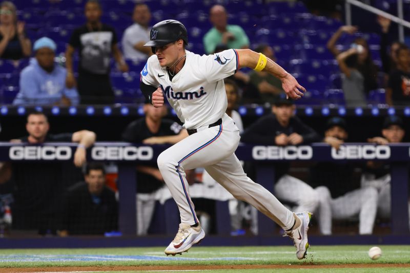 Sep 4, 2024; Miami, Florida, USA; Miami Marlins right fielder Griffin Conine (56) runs toward home plate after a double by catcher Nick Fortes (not pictured) against the Washington Nationals during the sixth inning at loanDepot Park. Mandatory Credit: Sam Navarro-Imagn Images