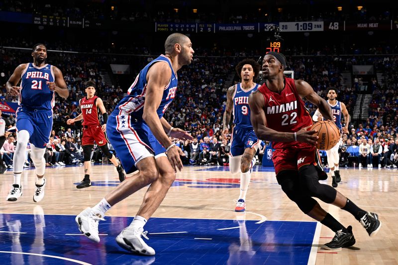 PHILADELPHIA, PA - APRIL 17:  Jimmy Butler #22 of the Miami Heat drives to the basket during the game against the Philadelphia 76ers during the 2024 NBA Play-In Tournament on April 17, 2024 at the Wells Fargo Center in Philadelphia, Pennsylvania NOTE TO USER: User expressly acknowledges and agrees that, by downloading and/or using this Photograph, user is consenting to the terms and conditions of the Getty Images License Agreement. Mandatory Copyright Notice: Copyright 2024 NBAE (Photo by David Dow/NBAE via Getty Images)