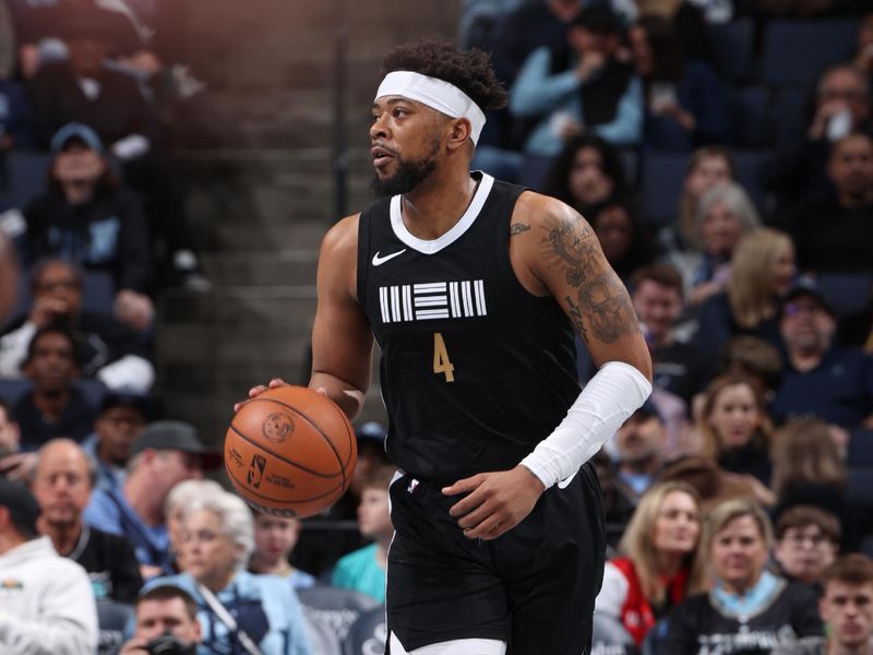 MEMPHIS, TN - MARCH 8: Jordan Goodwin #4 of the Memphis Grizzlies dribbles the ball during the game against the Atlanta Hawks on March 8, 2024 at FedExForum in Memphis, Tennessee. NOTE TO USER: User expressly acknowledges and agrees that, by downloading and or using this photograph, User is consenting to the terms and conditions of the Getty Images License Agreement. Mandatory Copyright Notice: Copyright 2024 NBAE (Photo by Joe Murphy/NBAE via Getty Images)