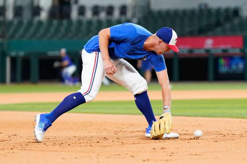 Jul 3, 2024; Arlington, Texas, USA; Texas Rangers third baseman Josh Jung during team warmups before the game against the San Diego Padres at Globe Life Field. Mandatory Credit: Jim Cowsert-USA TODAY Sports