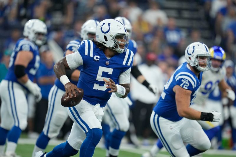 Indianapolis Colts quarterback Anthony Richardson looks to throw a pass during the first half of an NFL football game against the Los Angeles Rams, Sunday, Oct. 1, 2023, in Indianapolis. (AP Photo/Michael Conroy)