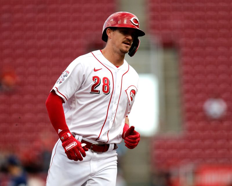 Apr 17, 2023; Cincinnati, Ohio, USA; Cincinnati Reds designated hitter Kevin Newman (28) rounds the bases after hitting a solo home run against the Tampa Bay Rays during the second inning at Great American Ball Park. Mandatory Credit: David Kohl-USA TODAY Sports