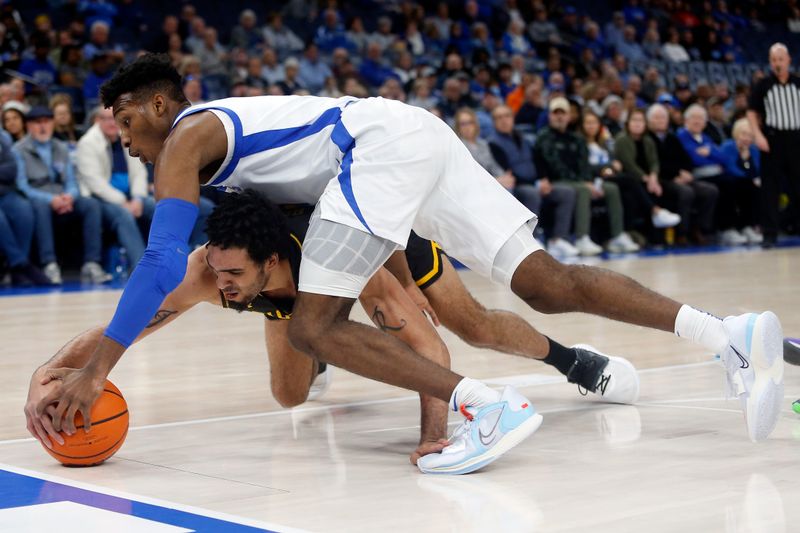 Jan 19, 2023; Memphis, Tennessee, USA; Wichita State Shockers forward James Rojas (33) and Memphis Tigers guard Keonte Kennedy (1) battle for a loose ball during the first half at FedExForum. Mandatory Credit: Petre Thomas-USA TODAY Sports