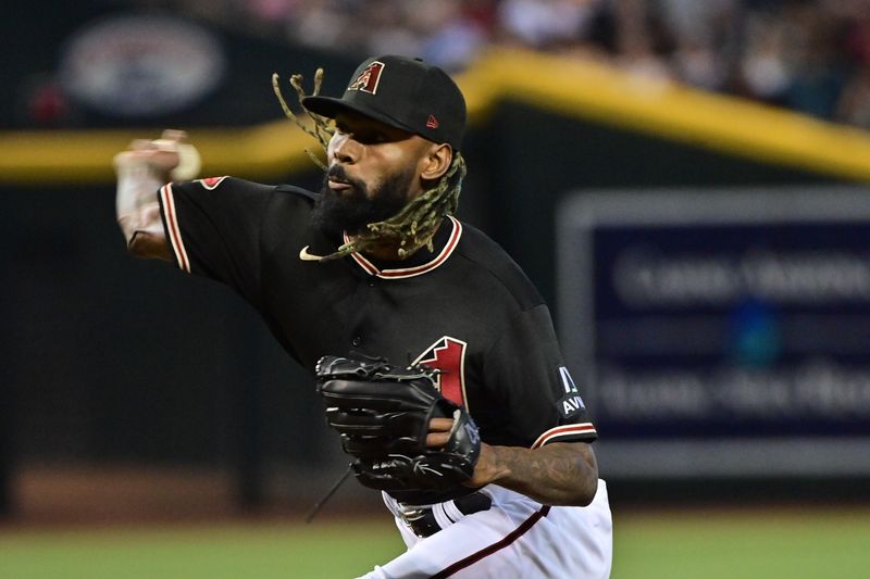 May 27, 2023; Phoenix, Arizona, USA;  Arizona Diamondbacks relief pitcher Miguel Castro (50) throws against the Arizona Diamondbacks in the ninth inning at Chase Field. Mandatory Credit: Matt Kartozian-USA TODAY Sports