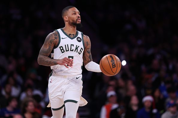 NEW YORK, NEW YORK - DECEMBER 23: Damian Lillard #0 of the Milwaukee Bucks brings the ball up the court during the third quarter of the game against the New York Knicks at Madison Square Garden on December 23, 2023 in New York City. NOTE TO USER: User expressly acknowledges and agrees that, by downloading and or using this photograph, User is consenting to the terms and conditions of the Getty Images License Agreement. (Photo by Dustin Satloff/Getty Images)