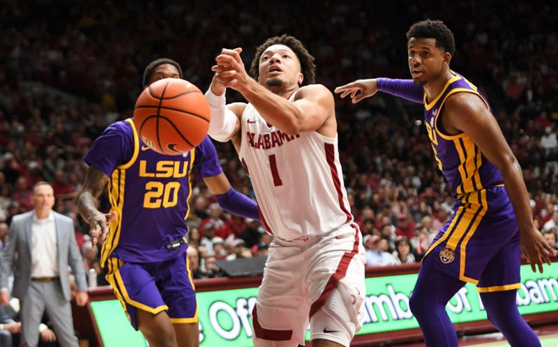 Jan 27, 2024; Tuscaloosa, Alabama, USA; Alabama guard Mark Sears (1) loses control of the ball as he drives against LSU forward Derek Fountain (20) and 
LSU guard Jordan Wright (6) at Coleman Coliseum. Mandatory Credit: Gary Cosby Jr.-USA TODAY Sports