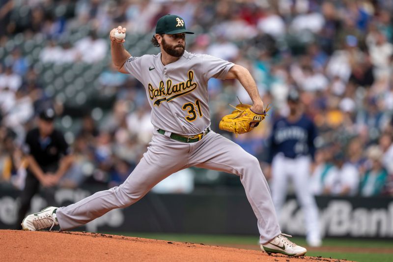 Aug 30, 2023; Seattle, Washington, USA; Oakland Athletics starter Zach Neal (31) delivers a pitch during the first inning against the Seattle Mariners at T-Mobile Park. Mandatory Credit: Stephen Brashear-USA TODAY Sports