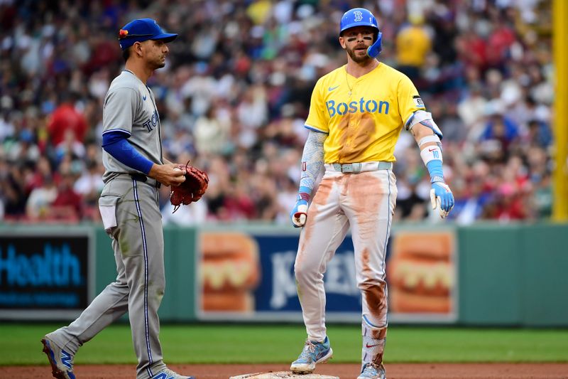 Jun 28, 2025; Boston, Massachusetts, USA; Boston Red Sox shortstop Trevor Story (10) stands on second base after hitting a double during the sixth inning against the Toronto Blue Jays at Fenway Park. Mandatory Credit: Bob DeChiara-Imagn Images