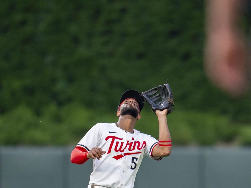 Jun 10, 2025; Minneapolis, Minnesota, USA; Minnesota Twins second baseman Willi Castro (50) catches a fly ball agains the Texas Rangers in the fifth inning at Target Field. Mandatory Credit: Jesse Johnson-Imagn Images