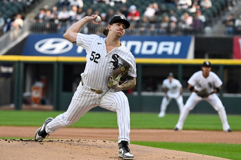 May 11, 2024; Chicago, Illinois, USA;  Chicago White Sox pitcher Mike Clevinger (52) delivers against the Cleveland Guardians during the first inning at Guaranteed Rate Field. Mandatory Credit: Matt Marton-USA TODAY Sports