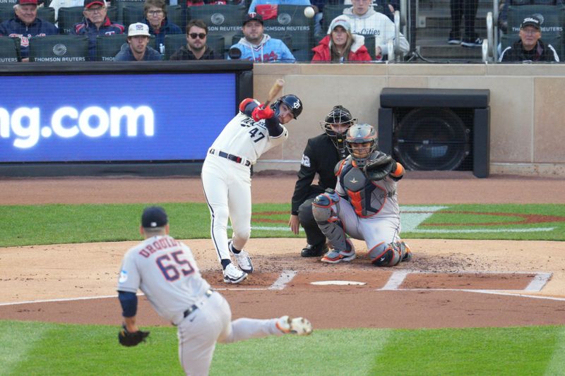 Oct 11, 2023; Minneapolis, Minnesota, USA; Minnesota Twins second baseman Edouard Julien (47) hits double in the first inning against the Houston Astros during game four of the ALDS for the 2023 MLB playoffs at Target Field. Mandatory Credit: Matt Blewett-USA TODAY Sports