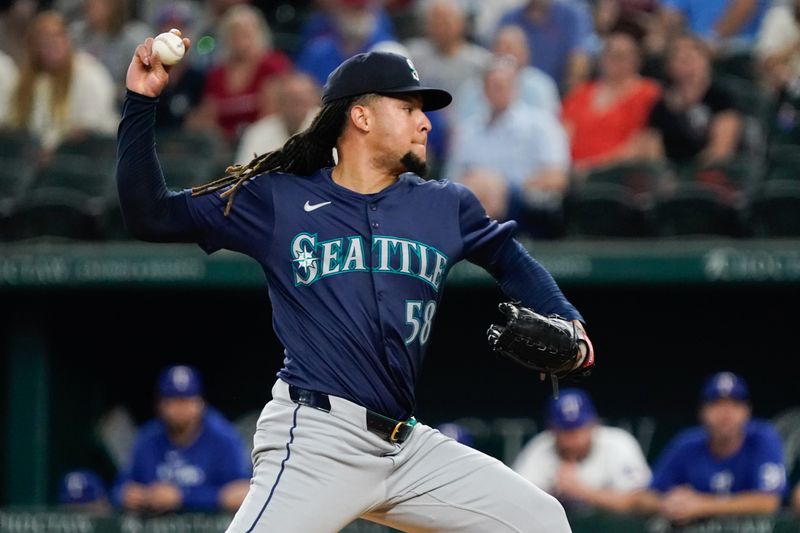 Apr 25, 2024; Arlington, Texas, USA; Seattle Mariners pitcher Luis Castillo (58) throws to the plate during the second inning against the Texas Rangers at Globe Life Field. Mandatory Credit: Raymond Carlin III-USA TODAY Sports