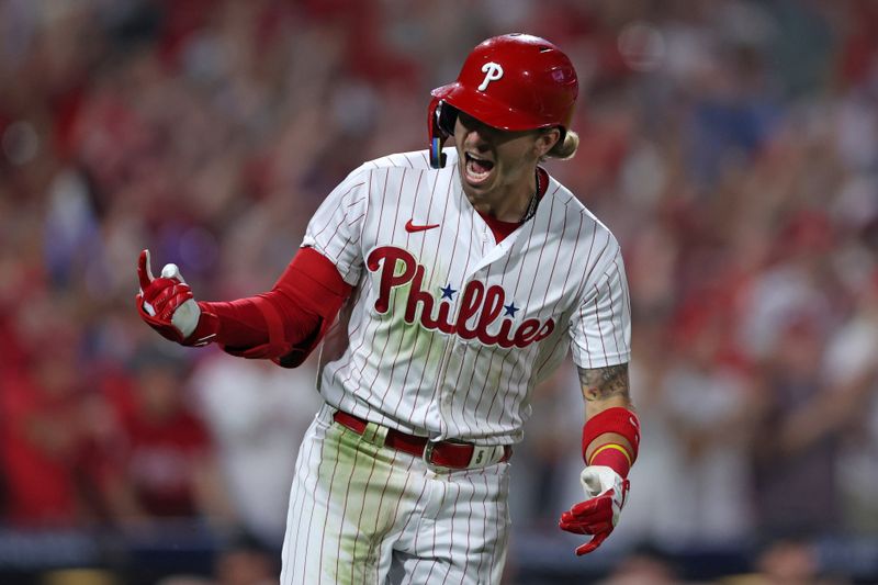 Oct 3, 2023; Philadelphia, Pennsylvania, USA; Philadelphia Phillies second baseman Bryson Stott (5) reacts after hitting a RBI single in the fourth inning against the Miami Marlins for game one of the Wildcard series for the 2023 MLB playoffs at Citizens Bank Park. Mandatory Credit: Bill Streicher-USA TODAY Sports