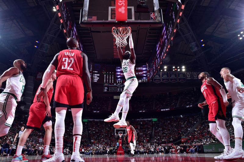 HOUSTON, TX - JANUARY 3:  Neemias Queta #88 of the Boston Celtics dunks the ball during the game against the Houston Rockets on January 3, 2025 at the Toyota Center in Houston, Texas. NOTE TO USER: User expressly acknowledges and agrees that, by downloading and or using this photograph, User is consenting to the terms and conditions of the Getty Images License Agreement. Mandatory Copyright Notice: Copyright 2025 NBAE (Photo by Logan Riely/NBAE via Getty Images)