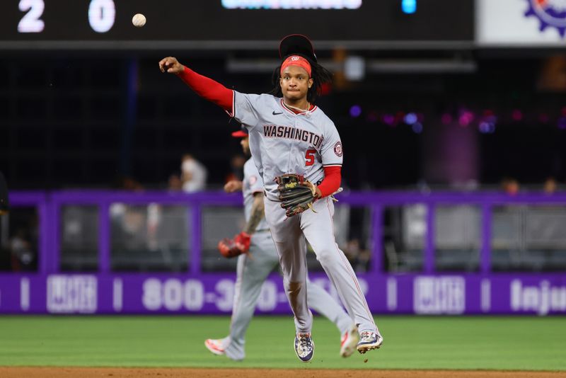 Sep 4, 2024; Miami, Florida, USA; Washington Nationals shortstop CJ Abrams (5) throws to first base to retire Miami Marlins first baseman Jake Burger (not pictured) during the fourth inning at loanDepot Park. Mandatory Credit: Sam Navarro-Imagn Images