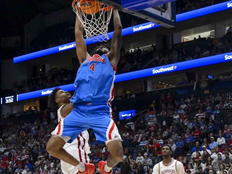 Mar 14, 2026; Nashville, TN, USA;  Mississippi Rebels forward James Scott (4) dunks the ball over against the Mississippi Rebels during the second half at Bridgestone Arena. Mandatory Credit: Steve Roberts-Imagn Images