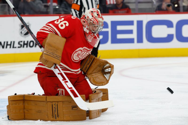 Oct 9, 2025; Detroit, Michigan, USA;  Detroit Red Wings goaltender John Gibson (36) makes the save in the first period against the Montréal Canadiens at Little Caesars Arena. Mandatory Credit: Rick Osentoski-Imagn Images